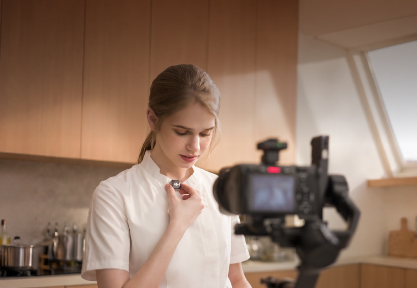 DJI Mic Mini 2S transmitter attached to clothing